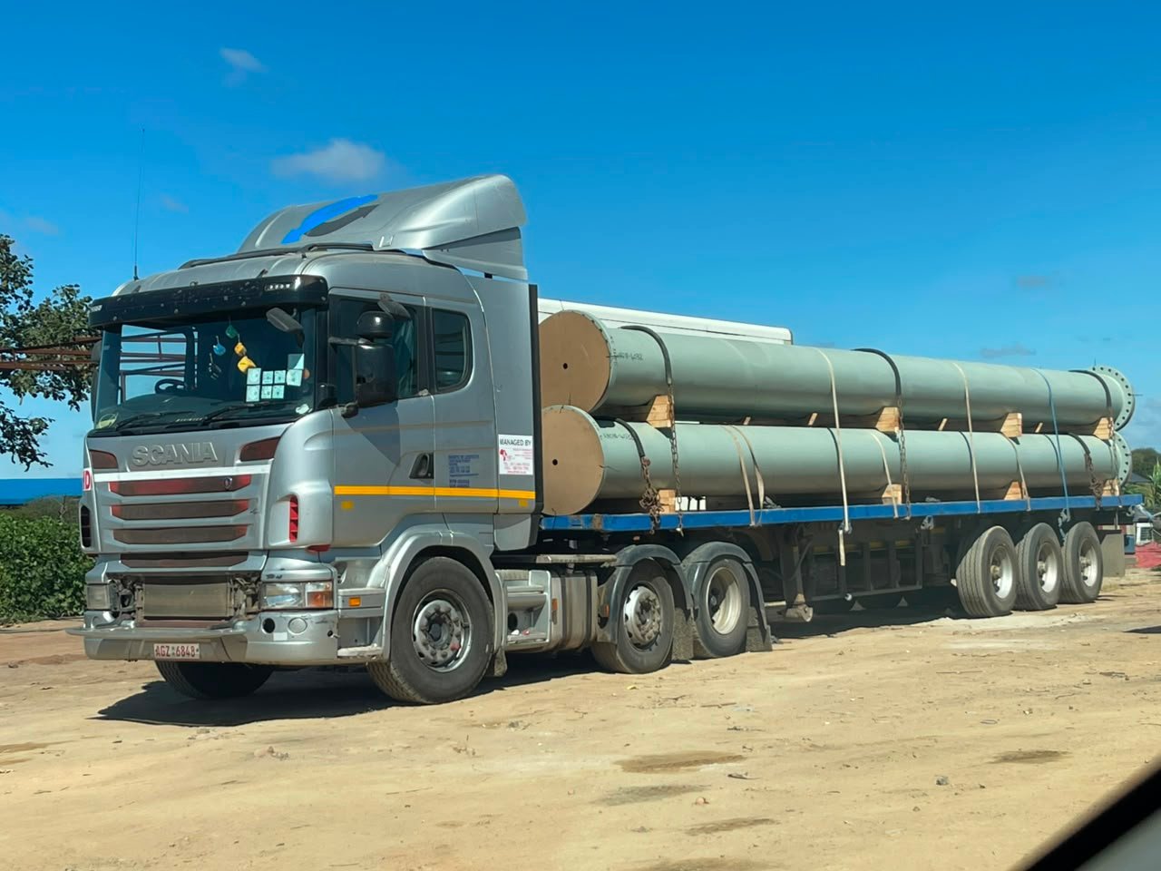 Heavy haulage truck carrying a tri-axle load